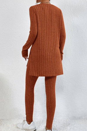 Back view of woman wearing rust-colored Butter Touch Ribbed Two-Piece Set with long ribbed top and matching fitted leggings