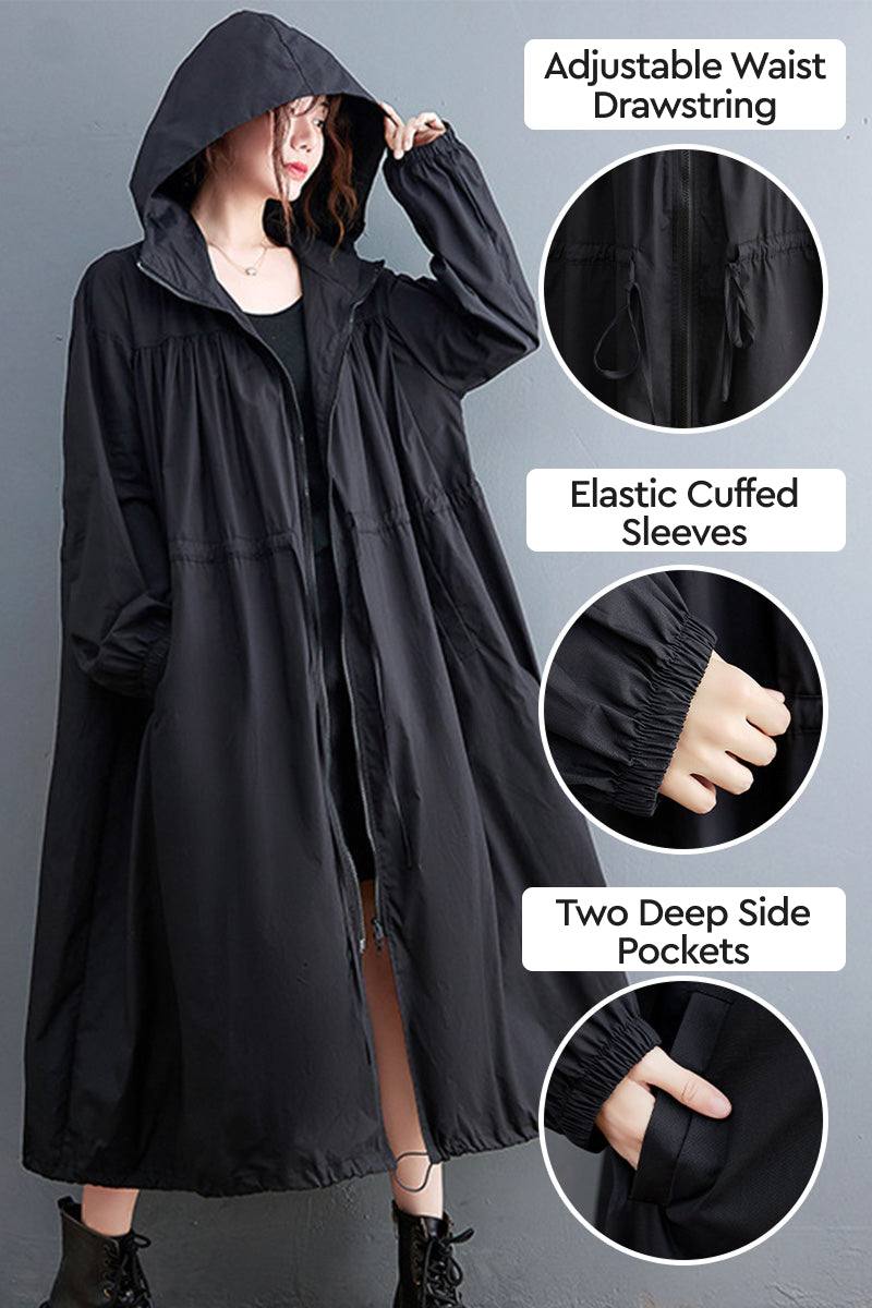 One size oversized all-weather water-resistant windbreaker with adjustable waist drawstring, elastic cuffed sleeves, and deep side pockets in black