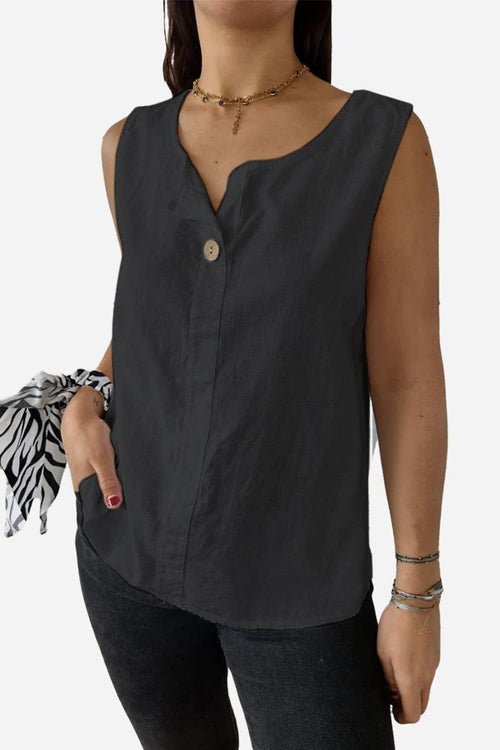 Woman wearing black 100% pure linen sleeveless vest with button and V-neck collar