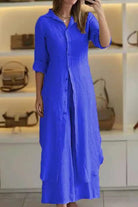 woman wearing a blue refined comfort coordinated wide-leg two-piece outfit with long button-down top and wide-leg pants