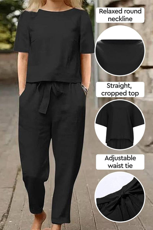 Black cotton-linen blend two-piece set with relaxed round neckline, cropped top, and adjustable waist tie