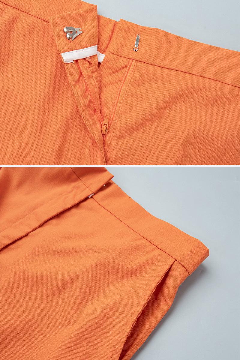 Close-up of sunset orange cotton-linen blend skirt with zipper and hook closure details