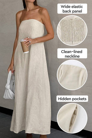 Strapless beige cotton linen blend dress with elastic back, clean neckline, and hidden pockets for a comfortable, elegant look