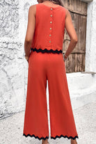 Women’s scalloped trim sleeveless top and wide leg pants set in terracotta with black edges and back button detail