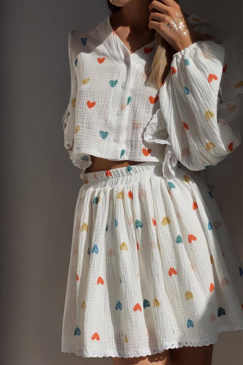Sweet Countryside 100 Cotton ruffled two-piece set with colorful heart prints, breathable cotton fabric, and relaxed fit.