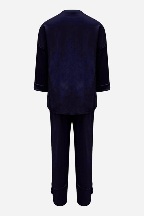 Back view of MILANO Comfort & Confidence navy two-piece set with sweatshirt and jogger pants in wrinkle-resistant polyester.