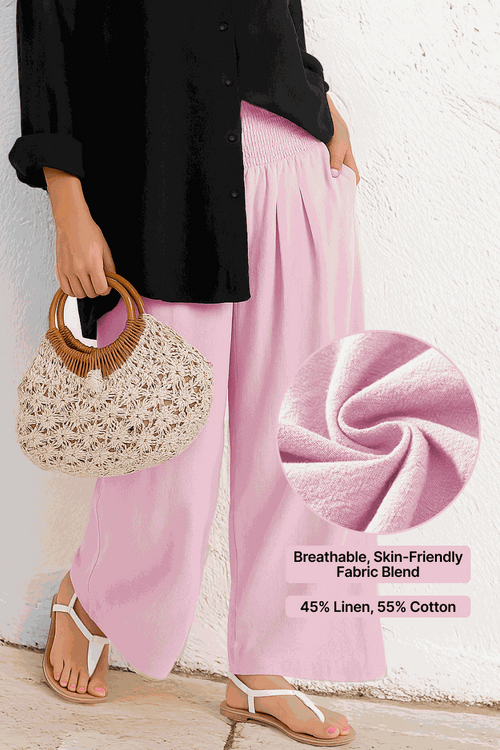 Woman wearing Oversized Linen Leaved-IN Set with black linen-blend shirt and pink flowy palazzo pants showcasing breathable linen-cotton fabric blend.