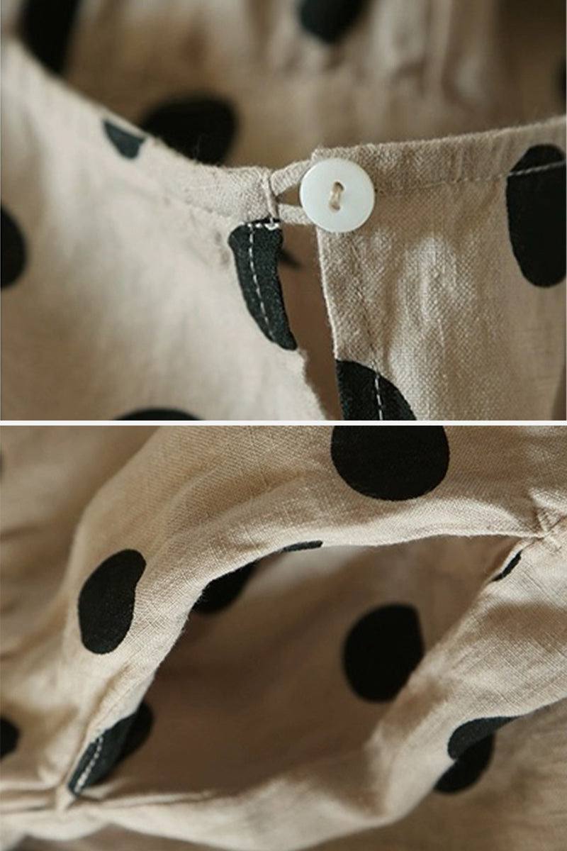 Close-up of Cottage Garden 100% linen polka dot dress fabric and button detail