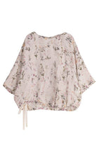 Botanical Garden linen blouse with floral print and drawstring hem