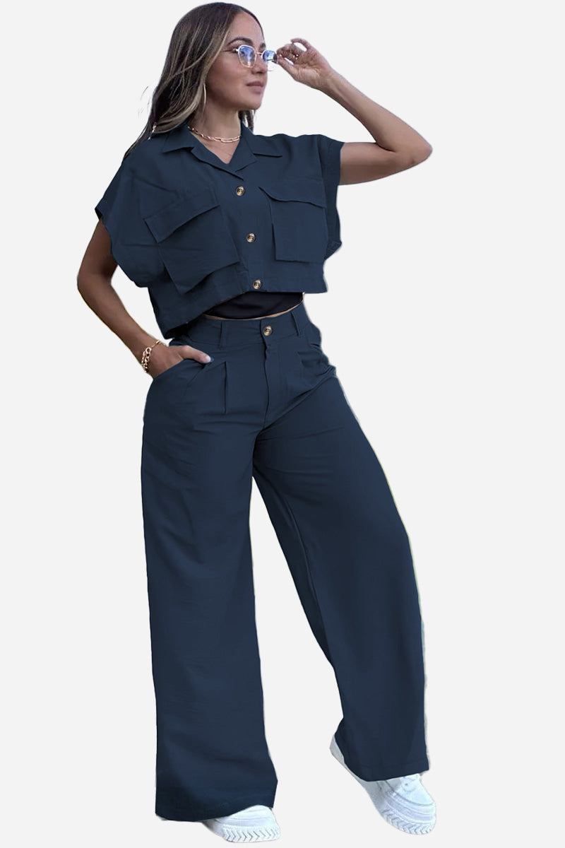 Woman wearing navy blue two-piece big pocket cargo set with cropped top and wide-leg pants