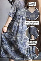 Beachside Bookstore cotton-linen midi dress with paisley pattern, v-neck, relaxed three-quarter sleeves, and adjustable waist tie.