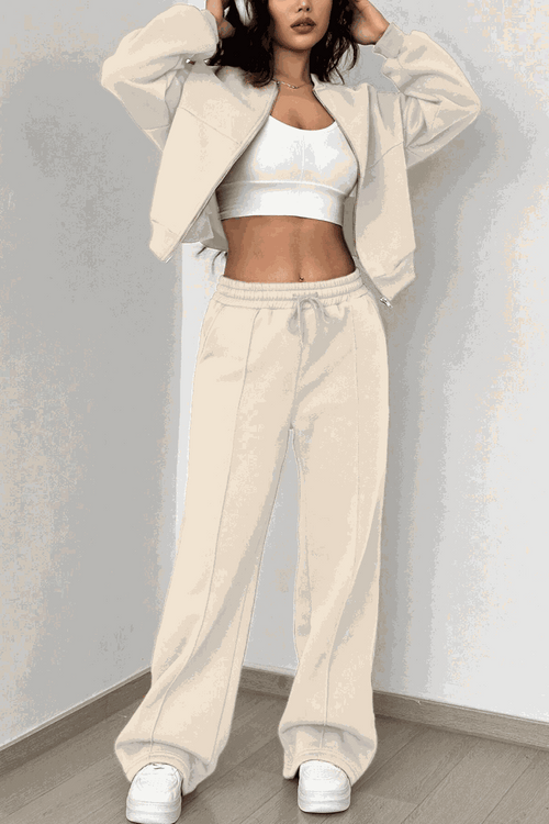 The Voyager Zip Set cream zip-front sweatshirt and wide-leg joggers travel outfit