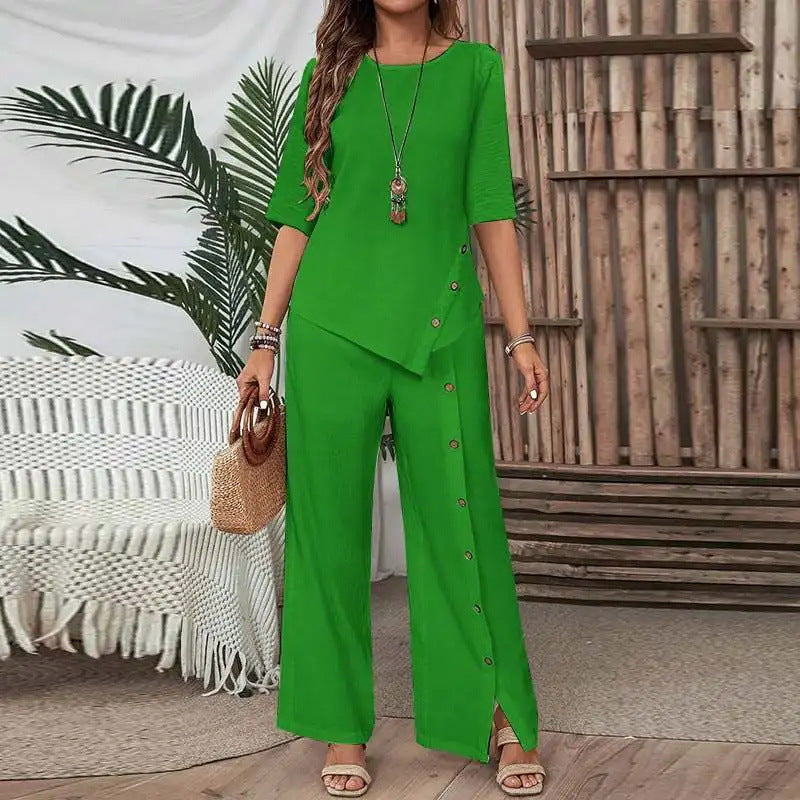 Green Asymmetry Flow Co-ord set with button-front top and loose wide-leg pants, featuring asymmetrical hem and flowing fabric for casual elegance