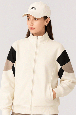 Comfort in Motion lightweight athleisure tracksuit jacket with black and beige sleeve accents, zip-up front, and relaxed sporty fit.