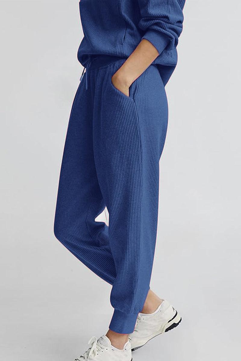 Unisex half-zip pullover and sweatpants set in blue polyester blend lounge outfit