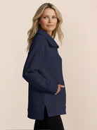 Half-zip waffle pullover with fold-over collar and kangaroo pocket in neutral tones
