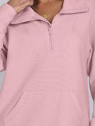 Women's half-zip waffle pullover sweater with kangaroo pocket and fold-over collar in neutral tone