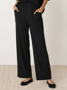 Oversized long-line loungewear set with pullover and straight-leg pants in soft knit fabric