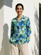 floral button-down shirt with long roll-up sleeves and hip length in relaxed fit