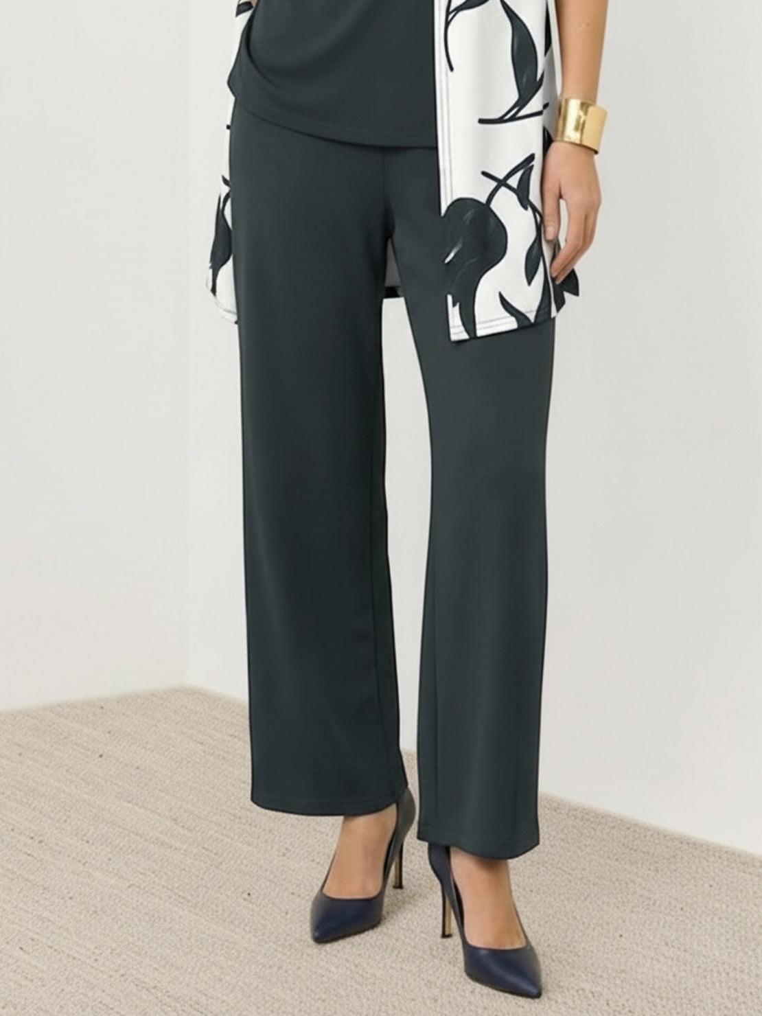 Woman wearing an open-front three-piece co-ord set with longline cardigan, round-neck tank, and wide-leg trousers