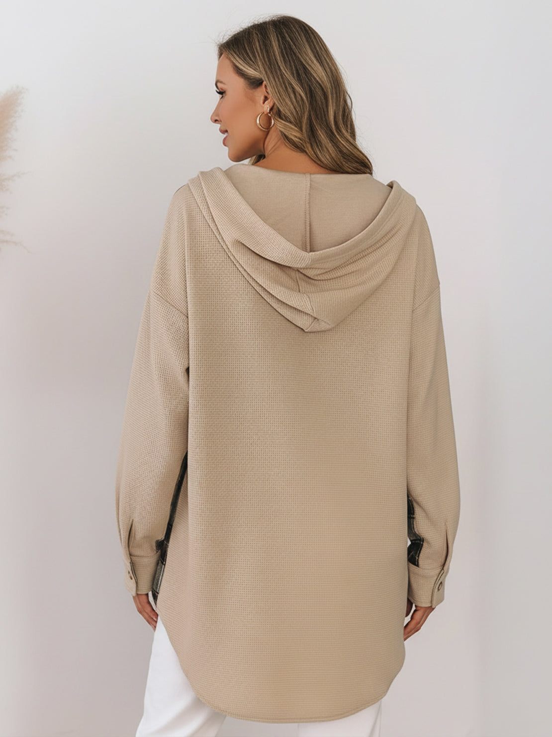 CloudKnit Oversized Hooded Shacket in textured waffle knit with button front, drawstring hood, and relaxed fit.