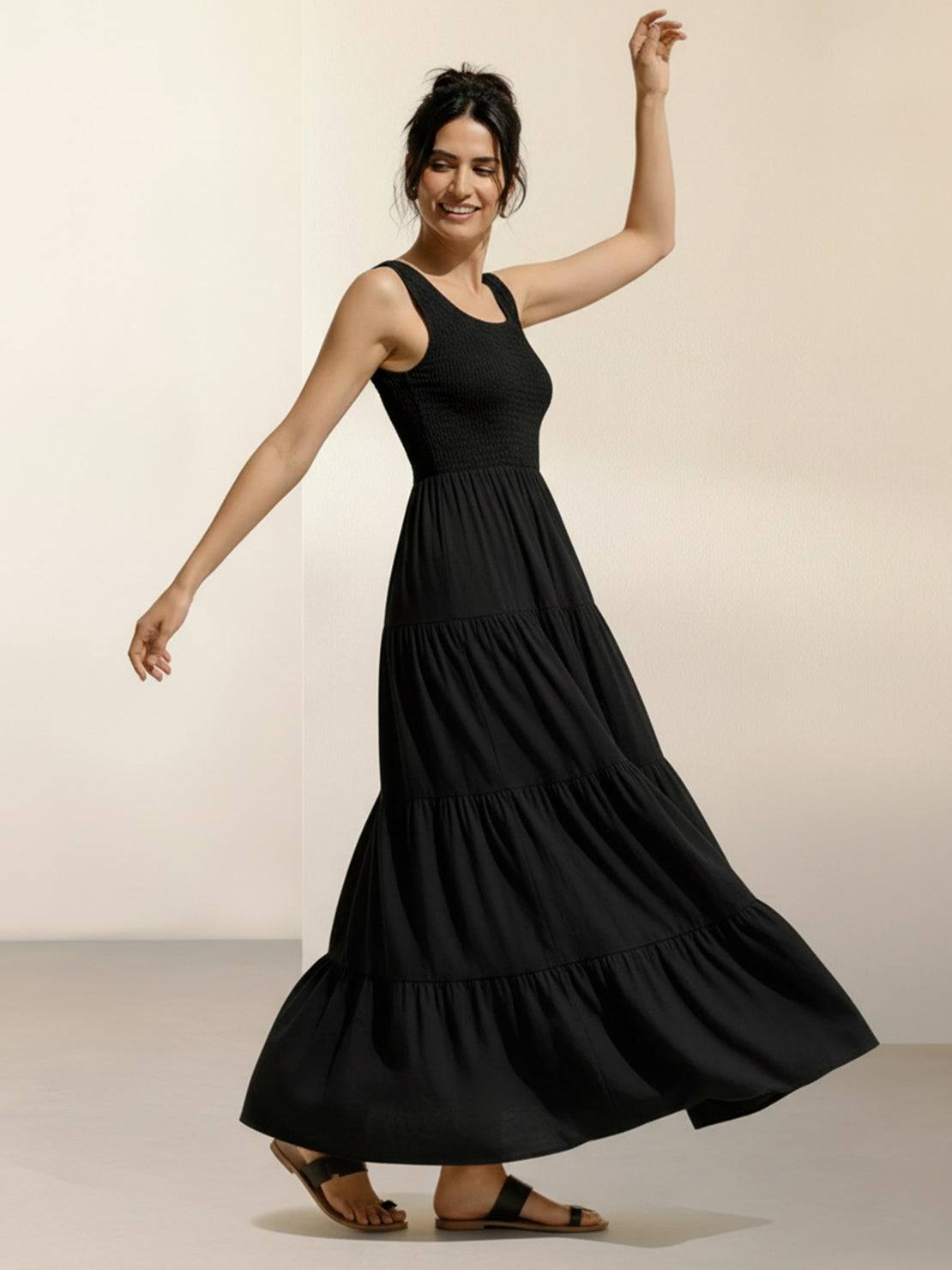 Smocked sleeveless maxi dress with tiered skirt and scoop neckline in lightweight fabric