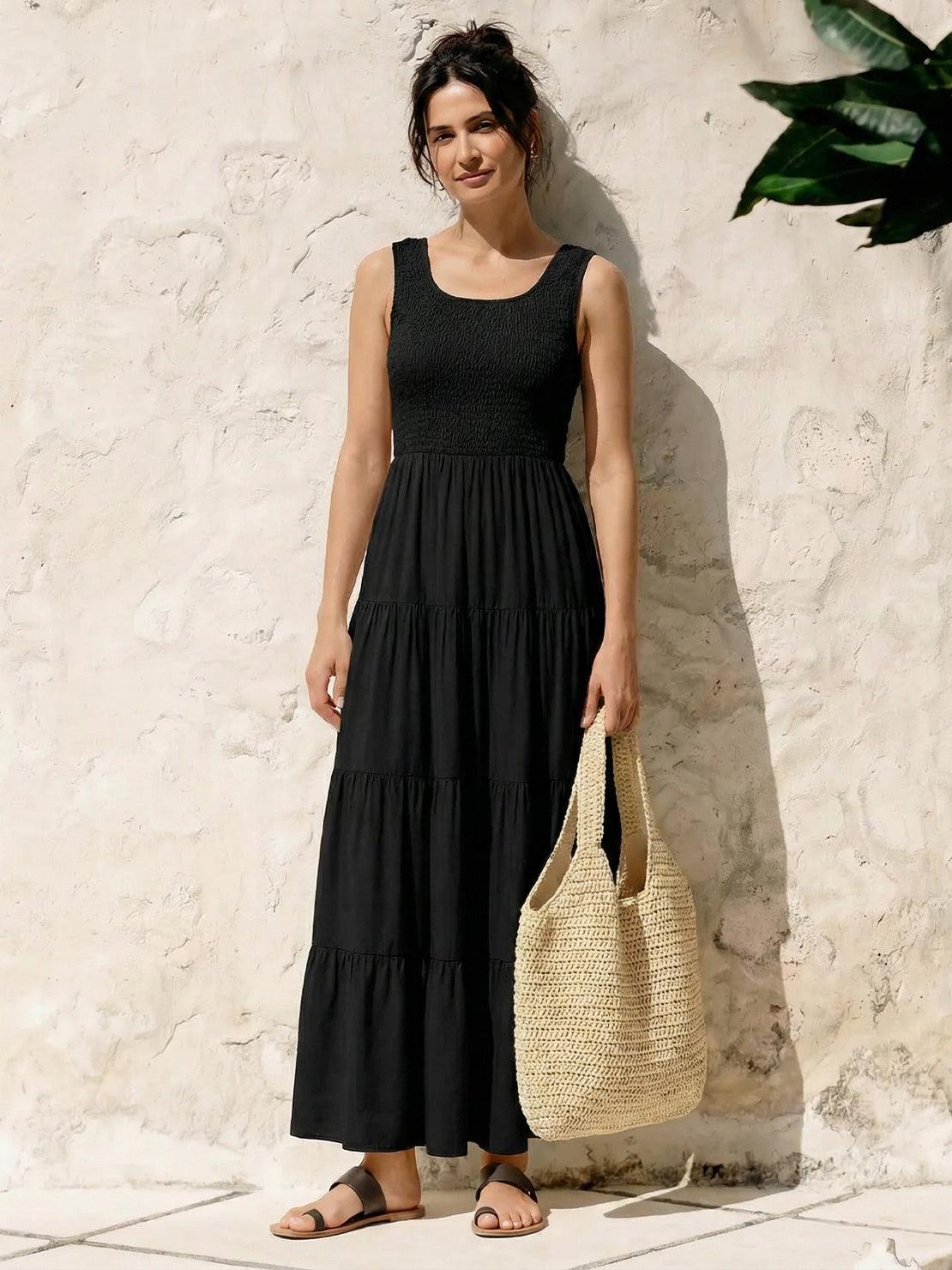 Smocked sleeveless maxi dress with tiered skirt and scoop neckline in lightweight fabric
