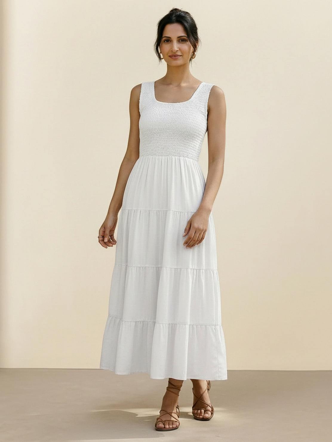 Smocked sleeveless maxi dress with tiered skirt and scoop neckline in lightweight fabric