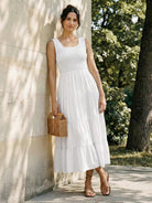 Smocked sleeveless maxi dress with tiered skirt and scoop neckline