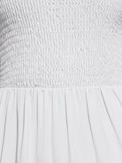 Smocked sleeveless maxi dress with tiered skirt and scoop neckline