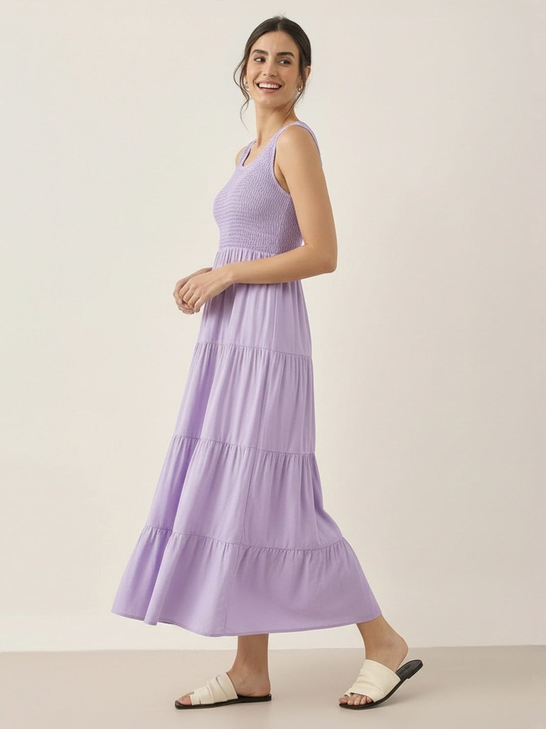 Smocked sleeveless maxi dress with tiered skirt and scoop neckline in lightweight fabric