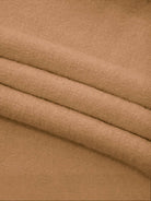 Oversized cable-knit crewneck sweater with dropped shoulders and ribbed trim