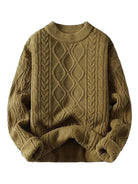 Oversized cable-knit crewneck sweater with dropped shoulders and textured diamond pattern in thick plush fabric
