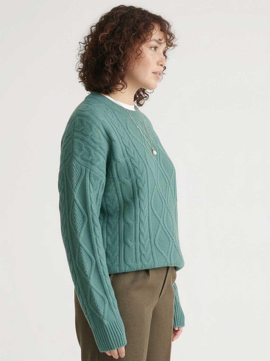 Oversized cable-knit crewneck sweater with dropped shoulders and ribbed trim in thick plush fabric