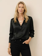 Silk-finish button front shirt with smooth fabric and relaxed fit