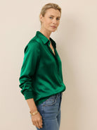 Silk-finish button front shirt with smooth polyester blend fabric and relaxed fit