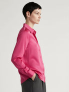 silk-finish button front shirt with smooth fabric and relaxed fit on white background