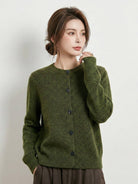 Marled knit merino wool cardigan with chunky texture and dark buttons