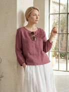 Cotton-linen embroidered blouse with relaxed boxy fit and 3/4 balloon sleeves