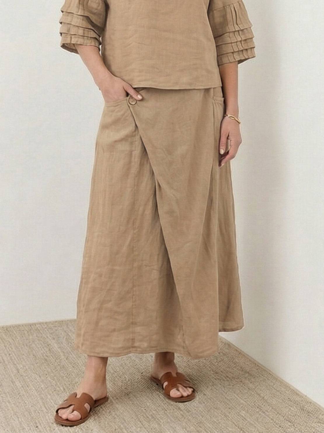 100% cotton two-piece wrap skirt and hip-length top set with natural crinkle texture and hidden elastic waistband