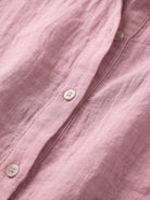 Lightweight 100% cotton popover blouse with relaxed oversized fit and crinkled texture