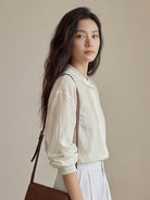 100% linen oversized jacquard shirt with tonal leaf pattern and relaxed fit