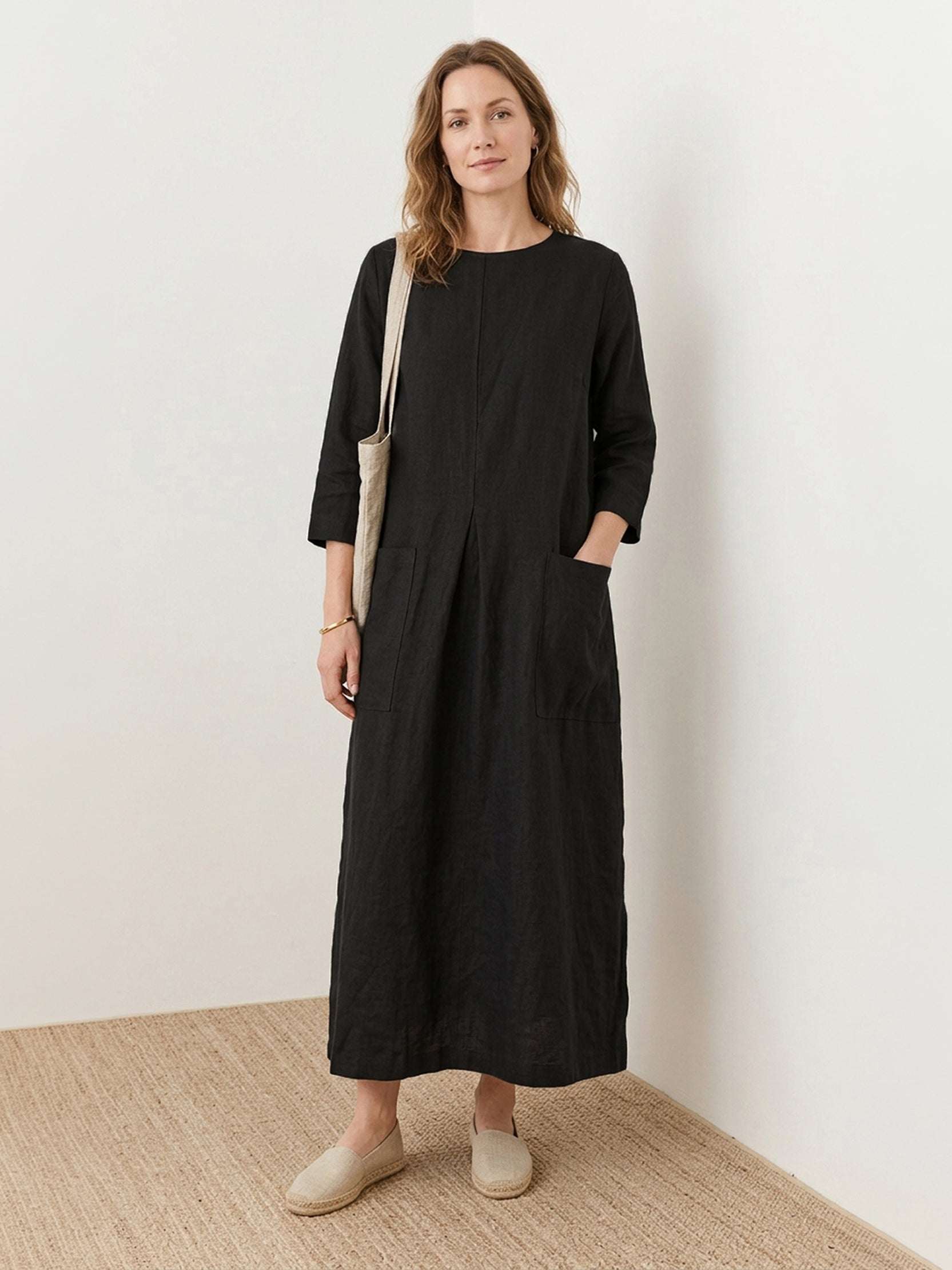 100% linen A-line maxi dress with 3/4 sleeves and large hip pockets