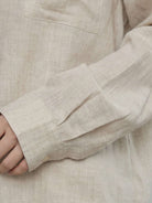 100% cotton-linen oversized classic shirt with dropped shoulders and curved hem