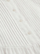 Sleeveless cotton linen pleated midi dress with round neckline and empire waist