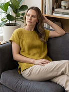 100% linen boxy cap-sleeve top with round scoop neck and hip-length hem