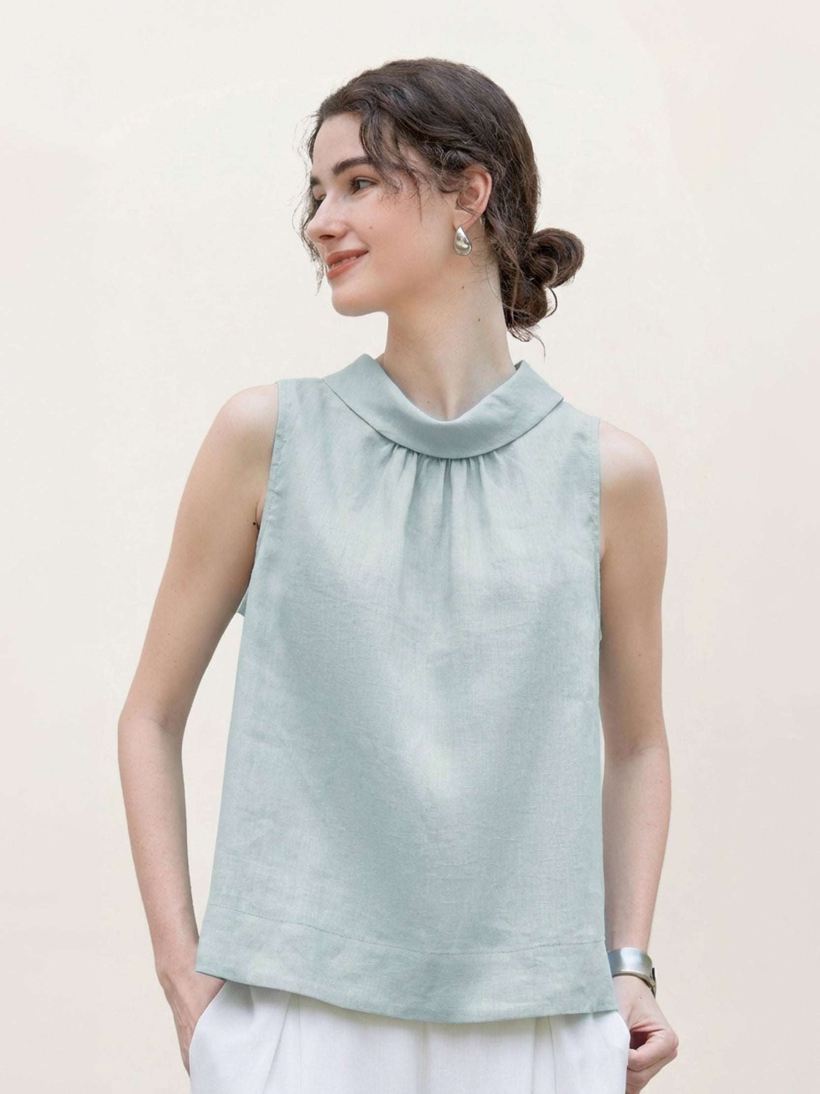 100% linen sleeveless cowl-collar top with boxy, slightly flared hem and natural texture