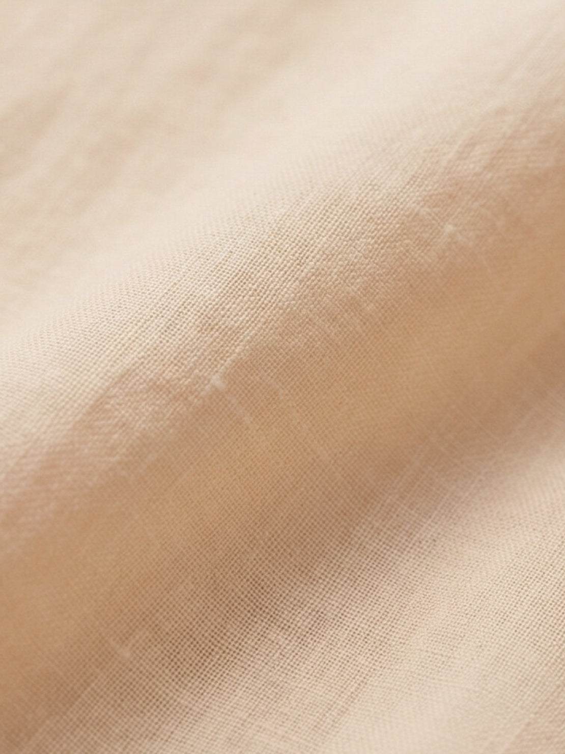 Lightweight 100% linen sheer overshirt with oversized fit and button front