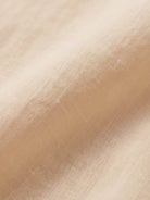 Lightweight 100% linen sheer overshirt with oversized fit and button front