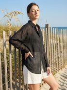 Lightweight 100% linen sheer overshirt with relaxed fit, button front, and dropped shoulders.